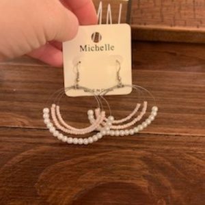 Earrings. Never worn.